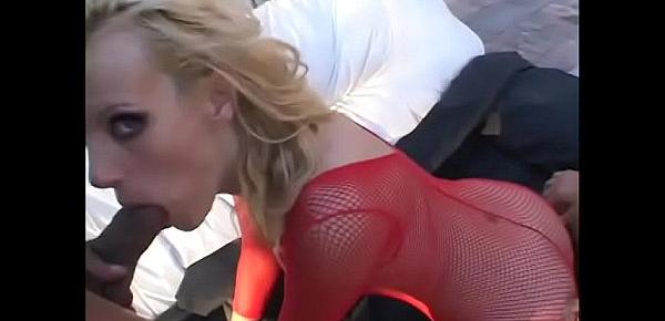  Slender white bitch in sexy red lingerie was caught by black and white thugs on the street then double penetrated by their dirty dicks